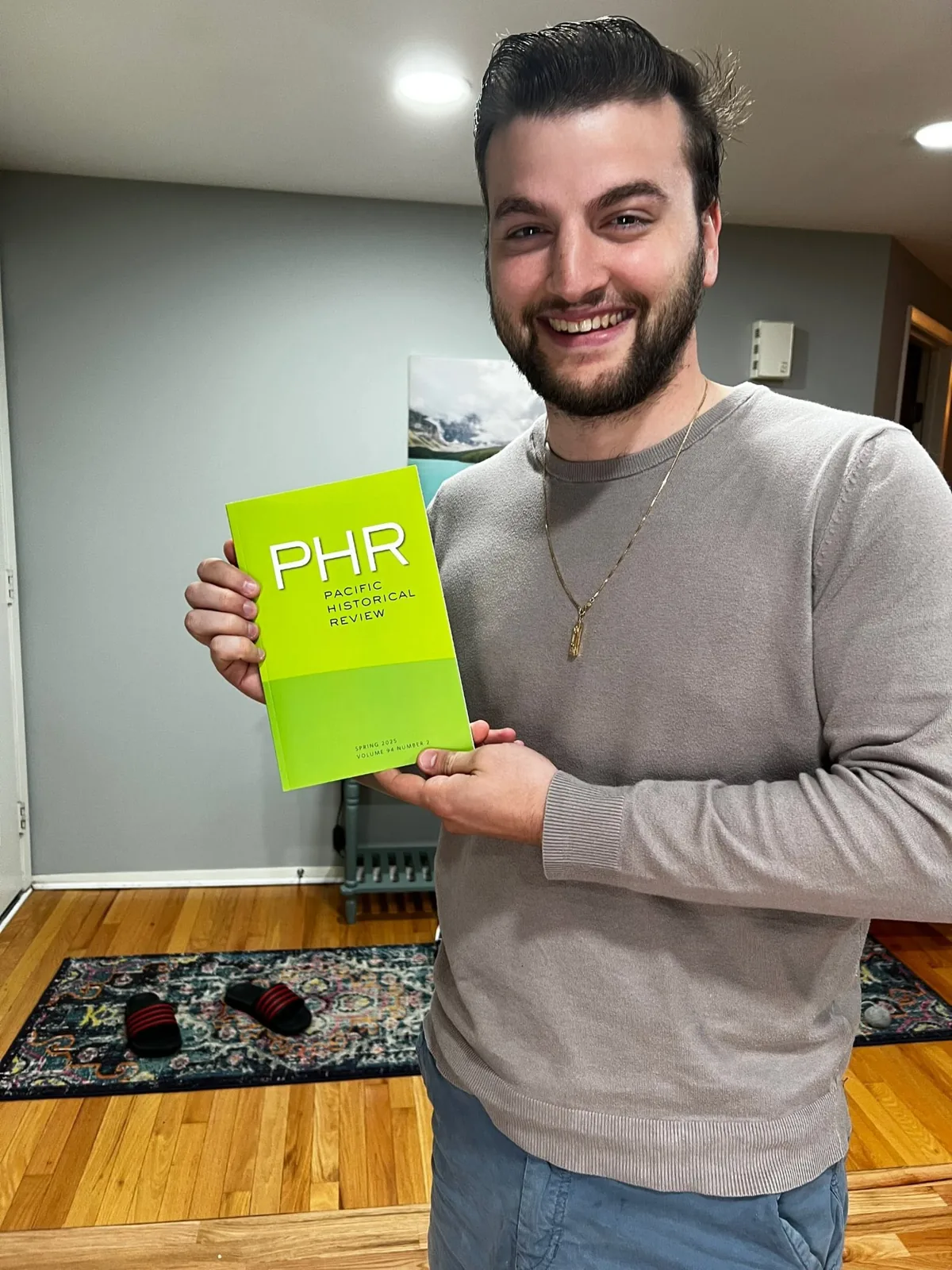 Zachary Tayler with his published article in Pacific Historical Review